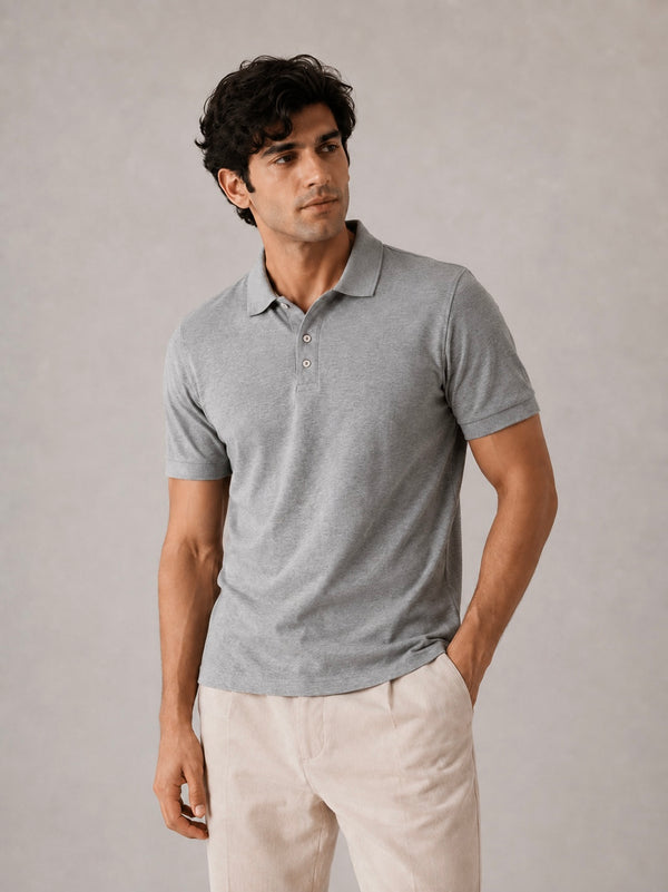 Men’s melange grey Airtex polo shirt, front view on model, structured anti-curl collar